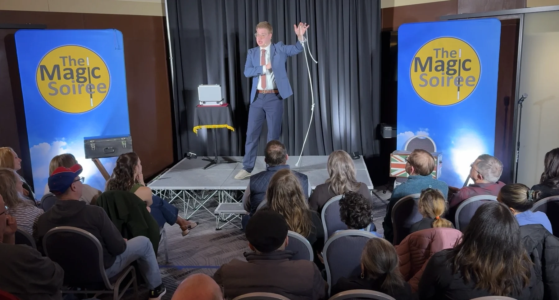 Chris Marvell performing rope magic for the audience at the Detroit Magic Soiree
